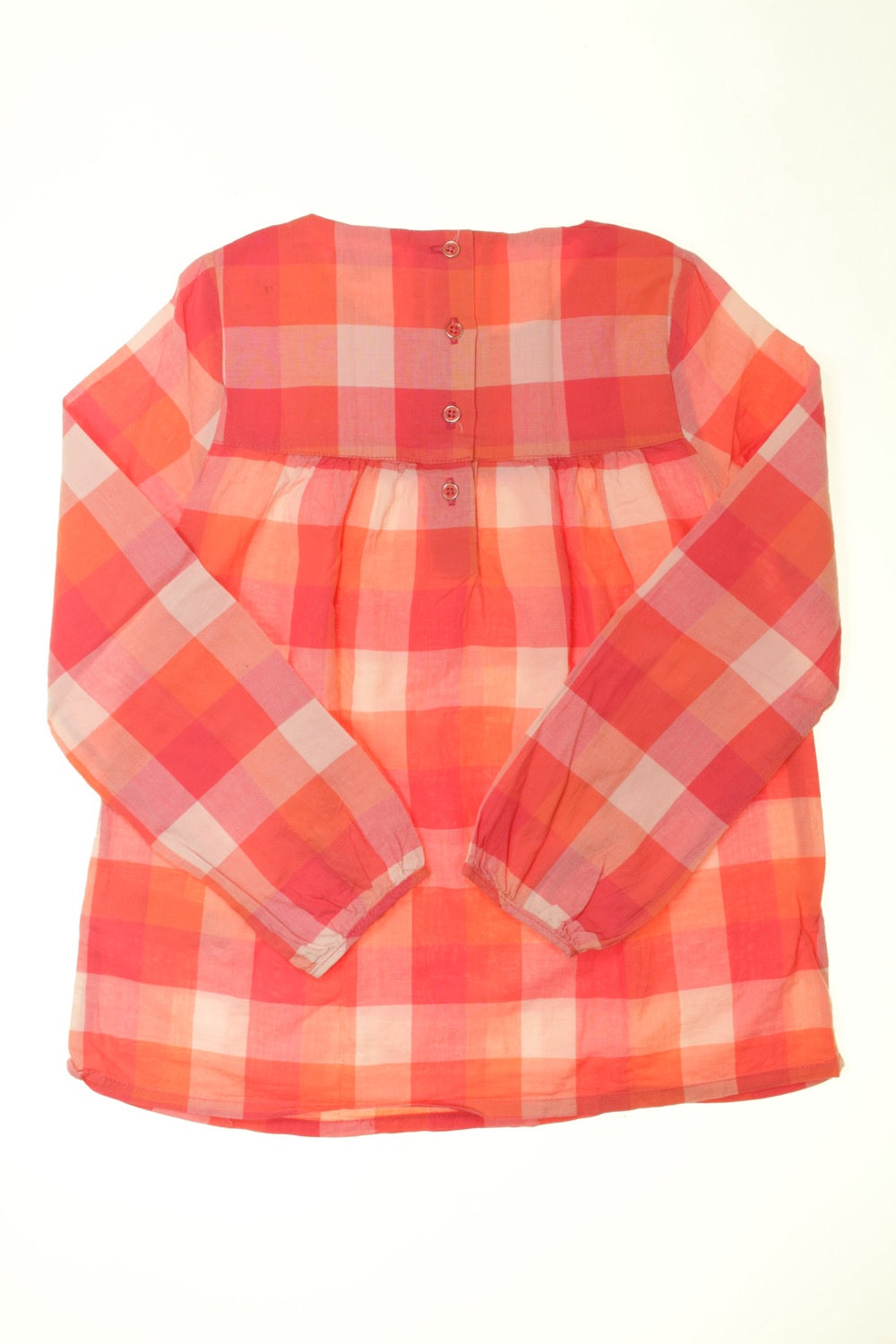 Blouse brodée à carreaux