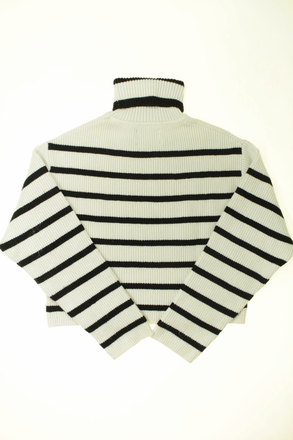 Pull col roulé court